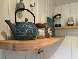 Cozy Heated interior inside Holly Tree Hut for chilly nights
