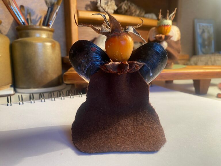 Glue the collar to the front of your Autumn Guardian