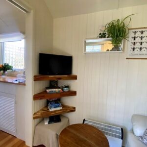 Cozy eco hut interior with natural materials and rustic design